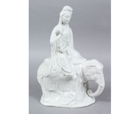A 20TH CENTURY CHINESE BLANC DE CHINE PORCELAIN FIGURE OF GUANYIN UPON ELEPHANT, 31.5CM HIGH