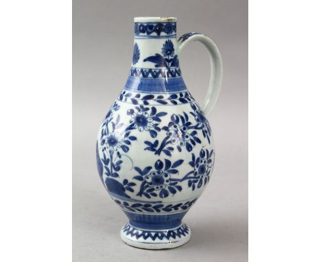 A GOOD JAPANESE 17TH CENTURY BLUE &amp; WHITE ARITA PORCELAIN EWER, the body with formal floral decoration with birds, 22cm h