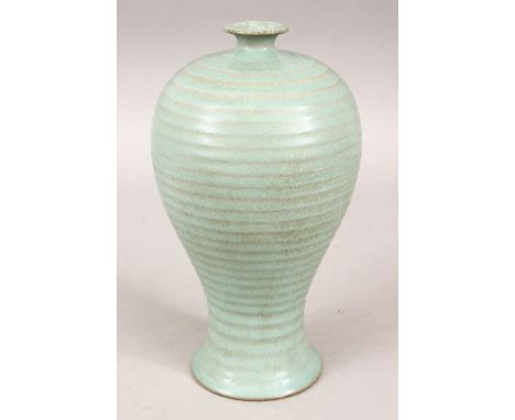 A GOOD CHINESE MOULDED &amp; RIBBED PORCELAIN MEIPING VASE, the base of the vase with incised chinese calligraphy / signature