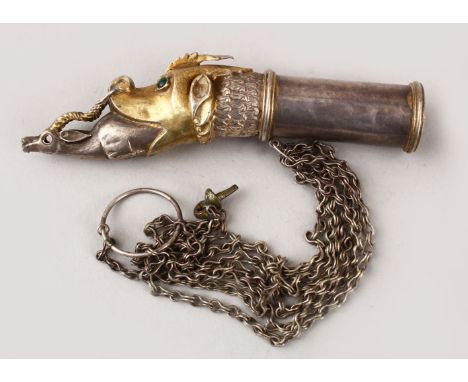 A GOOD 19TH CENTURY ISLAMIC SILVER &amp; GILT SMOKING PIPE IN THE FORM OF A DOG, the eyes inlaid with green stones, 11cm.