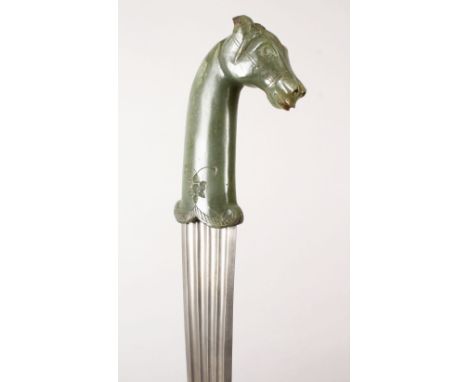 A 19TH CENTURY OR EARLIER PERSIAN / ISLAMIC CARVED JADE HANDLED DAGGER, the jade handle carved in the form of a horse head bu