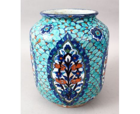 A LATE 18TH / 19TH CENTURY PALESTINIAN POTTERY VASE, with a deep &amp; light blue decorated ground with floral panels, 28cm h