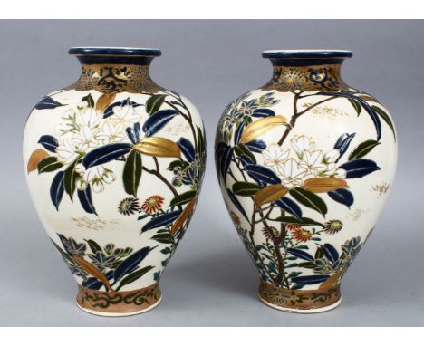 A GOOD PAIR OF JAPANESE IMPERIAL SATSUMA PORCELAIN VASES, each decorated with sprays of native flora highlighted with gilt, t