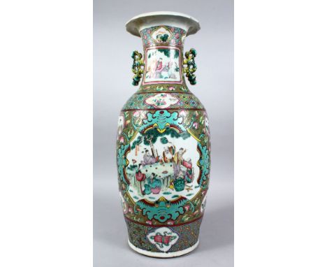 A 19TH CENTURY CHINESE FAMILLE ROSE / VERTE PORCELAIN TWIN HANDLE VASE, the body with many panels depicting figures interior 