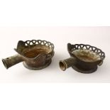 A PAIR OF 18TH / 19TH CENTURY CHINESE BRONZE SILK IRONS, 23CM WIDE.