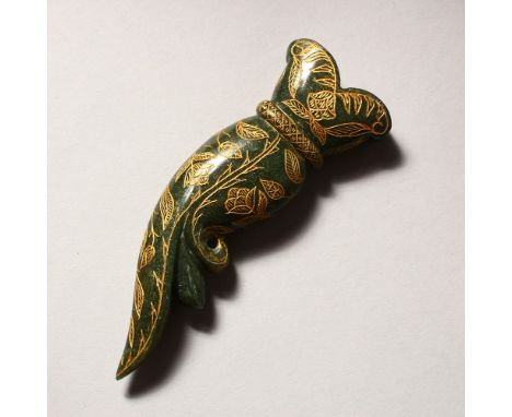 A GOOD EARLY 20TH CENTURY INDIAN MUGHAL CARVED JADE DAGGER KHANJAR HANDLE, carved with floral decoration highlighted with gil