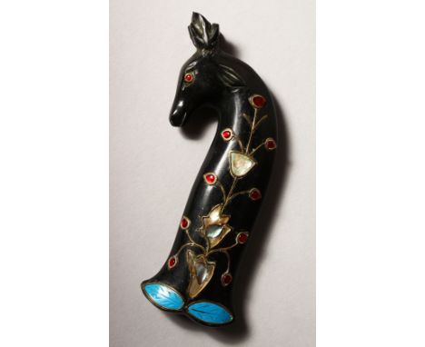 A GOOD EARLY 20TH CENTURY INDIAN MUGHAL CARVED JADE DAGGER KHANJAR HANDLE, in the form of a horse, inset with red stones and 