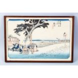 A JAPANESE MEIJI PERIOD WOODBLOCK PRINT OF A LANDSCAPE, framed, signed, 26cm x 38cm