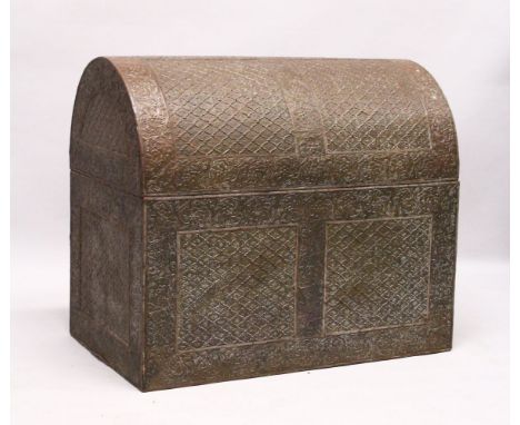 A LARGE 18TH / 19TH CENTURY WOOD &amp; BRASS INDIAN EMBOSSED CASKET / TRUNK, with embossed decoration depicting formal scroll