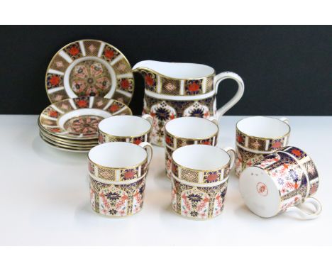 Royal Crown Derby 'Old Imari' 1128 pattern part tea set to include six cups and saucers and milk jug
