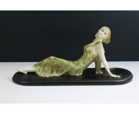 Art Deco style reclining lady ceramic figurine on base, H 17cm, W 38cm, D 14cm