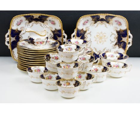 Coalport 'Bat Wing' tea service set to include two cake plates, milk jug, sugar bowl, twelve side plates, 18cm diameter and t