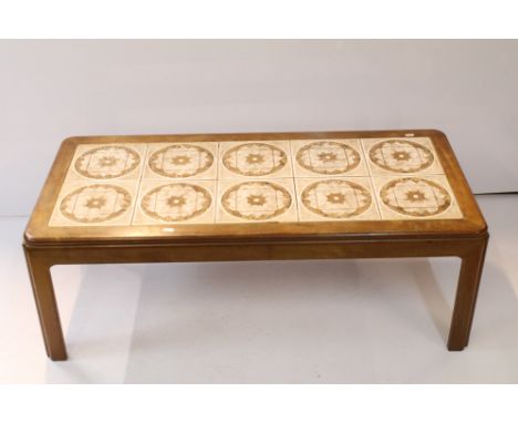 Two vintage 1970s tile top coffee tables having teak frames and ceramics tiles to top. Largest measures 39 x 100 x 50cm, smal