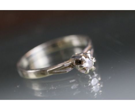 A ladies 18ct white gold solitaire ring, marked .750 to inner shank.