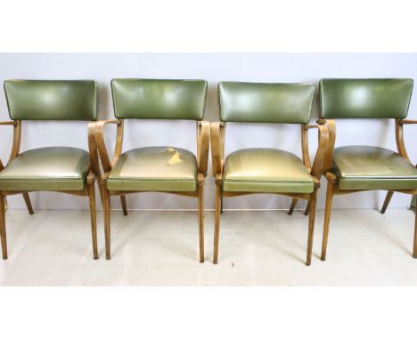 Set of four vintage mid 20th Century Ben chairs of stowe dining arm chairs having bent wood arms, tapering legs and green fau