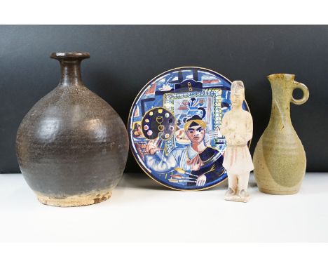 Tang Dynasty painted figure H 23cm together with a pottery patterned pitcher jug H 24cm