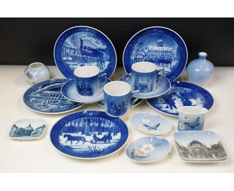 Royal Copenhagen items to include three Christmas cups and saucers, small vases, trinket trays and wall plates to include lim