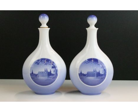 Pair of Royal Copenhagen Denmark, blue and white carafe bottle decanters decorated with Frederickborg Castle with crown marki