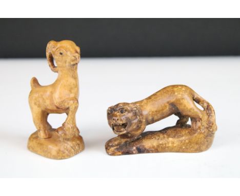 Two carved wooden netsuke figures to include Oriental Dragon and a goat on rock