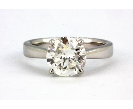 A 950 platinum solitaire ring set with a brilliant cut 2.41ct diamond, (M.5).