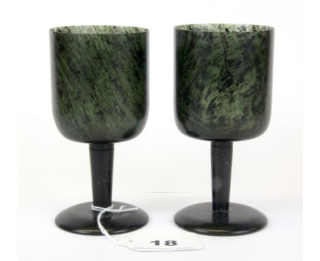 A pair of fine Chinese spinach jade wine cups, H. 11.5cm.