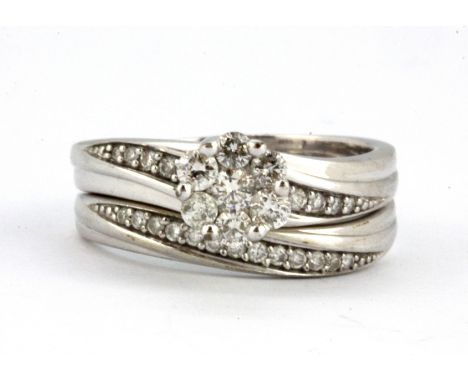 A 9ct white gold diamond set cluster ring and matching diamond set wedding band, (P).