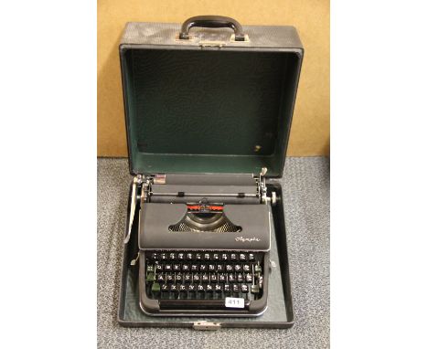 An Olympia portable typewriter.