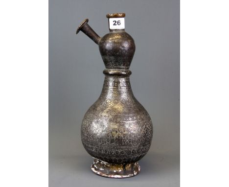 Islamic interest. An 18th Century Eastern silvered and engraved copper hookah pipe base, H. 34cm.
