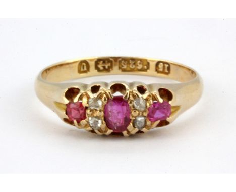 A 15ct yellow gold ruby and diamond set ring, (K).