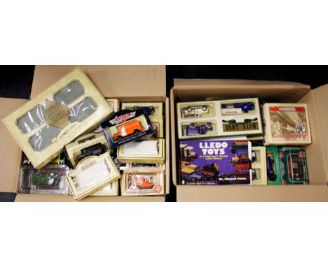 Two boxes of diecast model vehicles.
