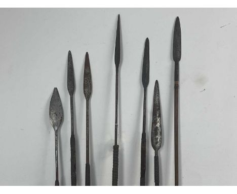 COLLECTION OF SEVEN ZULU ASSEGAI, 19TH/EARLY 20TH CENTURY each with steel tip, one with lower chisel toolthe largest 150cm lo