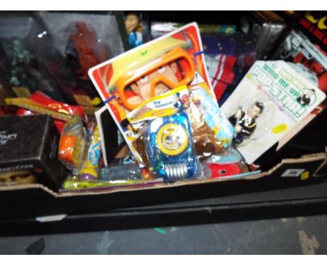 A quantity of predominately sealed blister packs to include Lord of the Rings, Curious George, James Bond, Mike the Knight, W