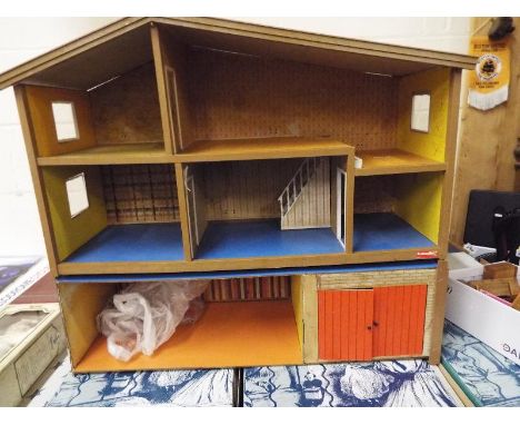 Two vintage Lundby dolls houses, the Gothenburg with garage extension and the Stockholm, included in the lot is a small amoun