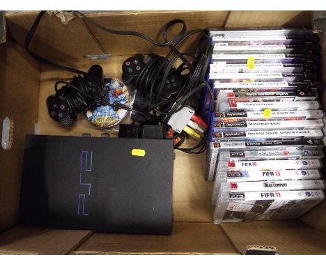 A PS2 Playstation 2 console model No. SCPH-50003, controllers and approximately ten PS2 games, included in the lot is a small