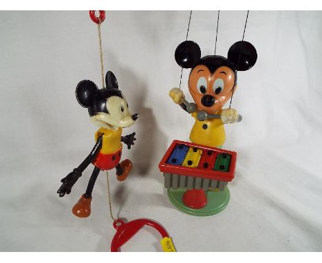 Disney - an early celluloid Mickey Mouse puppet playing a xylophone marked to the back Walt Disney productions made in Hong K