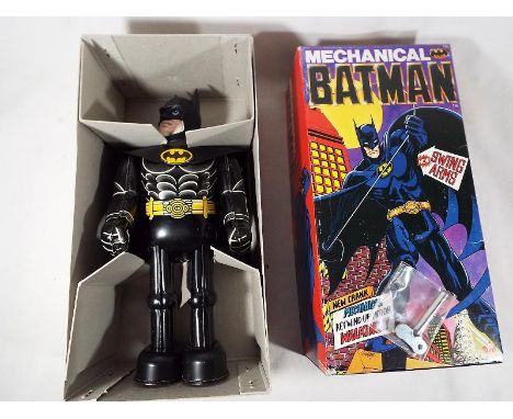 Batman mechanical tin-plate robot by Billiken, key wind-up motor walking, swinging arms, mint in excellent+ to near mint box 