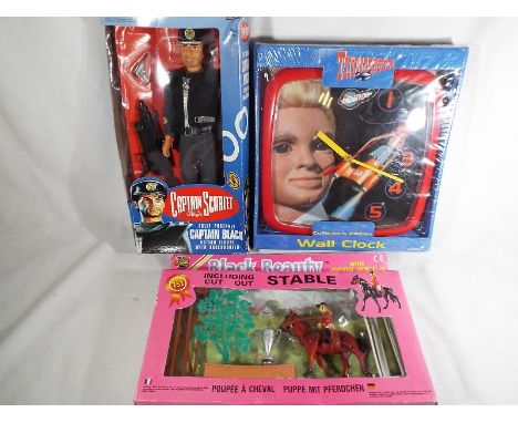 A good mixed lot to include Totopoly board game, a Captain Scarlett Captain Black figure, a Thunderbirds clock, sealed and bo