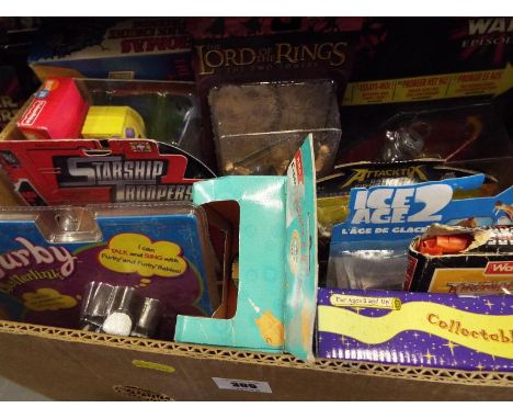 A good mixed lot of sealed blister packs to include Star Ship Troopers, Furby Chatterlink, Ice Age 2, Star Wars, Lord of the 