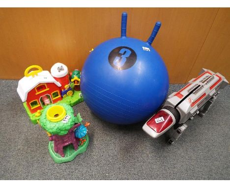 A mixed lot to include a collection of modern toys a Space Hopper, activity centre, Winnie the Pooh activity tree and a V.T.M