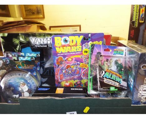 A collection of sealed blister packs and boxed figures to include Body Wars, the Golden Compass, Van Helsing, Monster Aliens,
