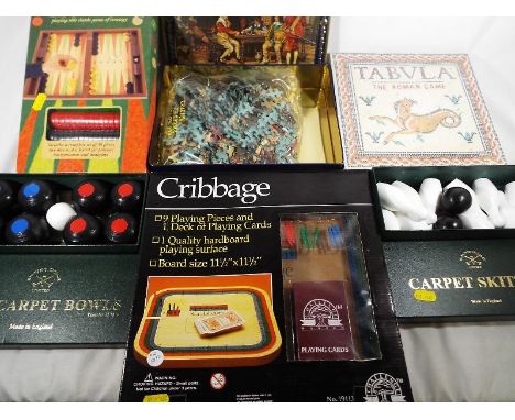 A good mixed lot of parlour games to include backgammon, carpet skittles, carpet bowls, a Roman game. cribbage and other, pre