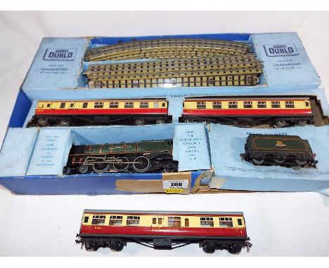 Model railways - a Hornby Dublo train set comprising Duchess of Montrose 4-6-2 with tender, 2 carriages, Midland livery and 3