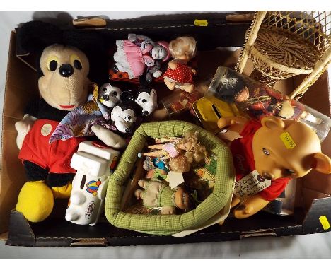 A good mixed lot of vintage and retro toys to include Walt Disney Mickey Mouse, Cabbage Patch dolls, dolls in various costume