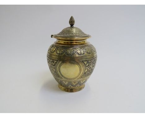 A Victorian John, Edward, Walter &amp; John Barnard silver gilt tea caddy with all over engraved detail, vacant cartouches an