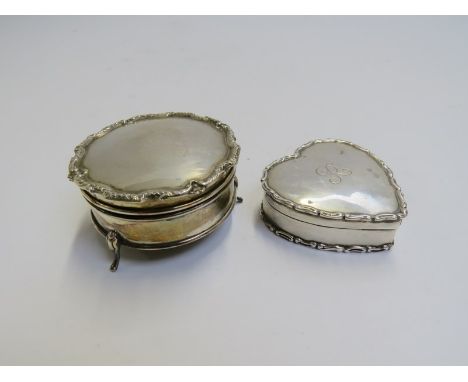 A Deakin &amp; Francis silver heart shaped trinket box, monogrammed 'R', Birmingham 1904, 5.5cm long (split) and a silver rin