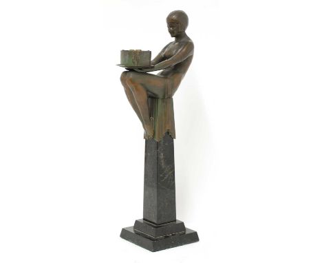 An Art Deco 'Biba' figural table lamp, in the form of a seated girl holding a lamp, shade missing, on a stepped marble column