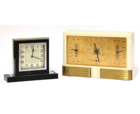 An Art Deco desk barometer,by Taylor Instrument Companies with a cream Bakelite body with gold details, the face divided into