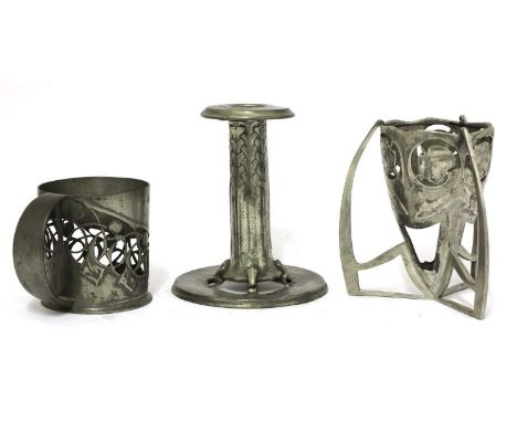 A collection of Liberty Tudric pewter wares,designed by Archibald Knox, comprising:a pewter pierced bowl on stand, numbered '