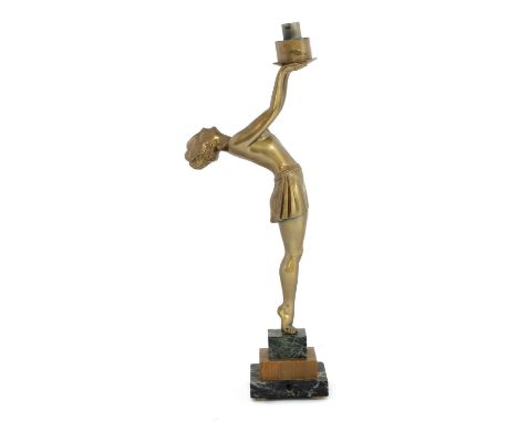 An Art Deco spelter table lamp,modelled as a girl standing on a plinth, with a globe shade,56cm high,together with an Art Dec