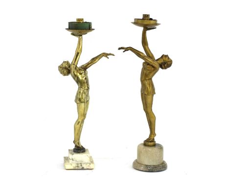 Two Art Deco gilt spelter figural lamps, on marble and onyx plinths, lacking shades,51cm high (2)Condition report: Both in wo